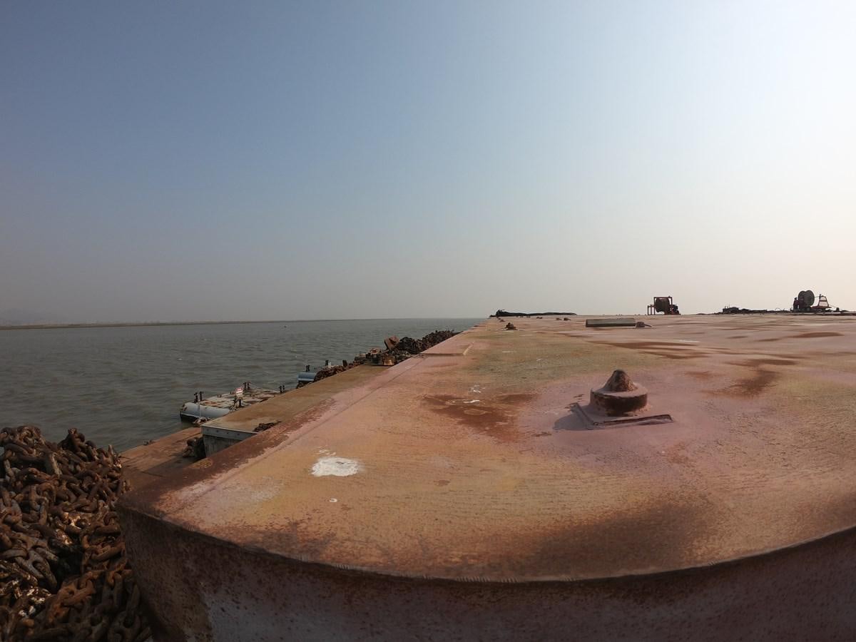 a sandy beach with boats aboard BARGES Yacht for Sale