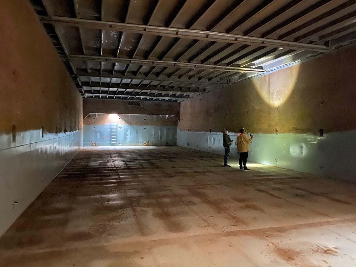 a couple of people in a tunnel aboard BARGES Yacht for Sale