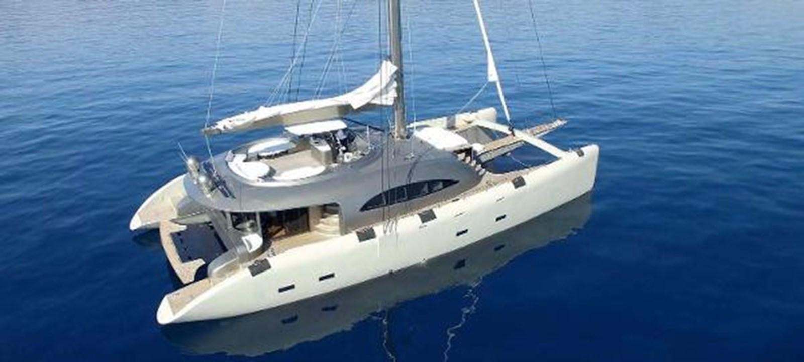 a white yacht on the water aboard JAMADHAR Yacht for Sale