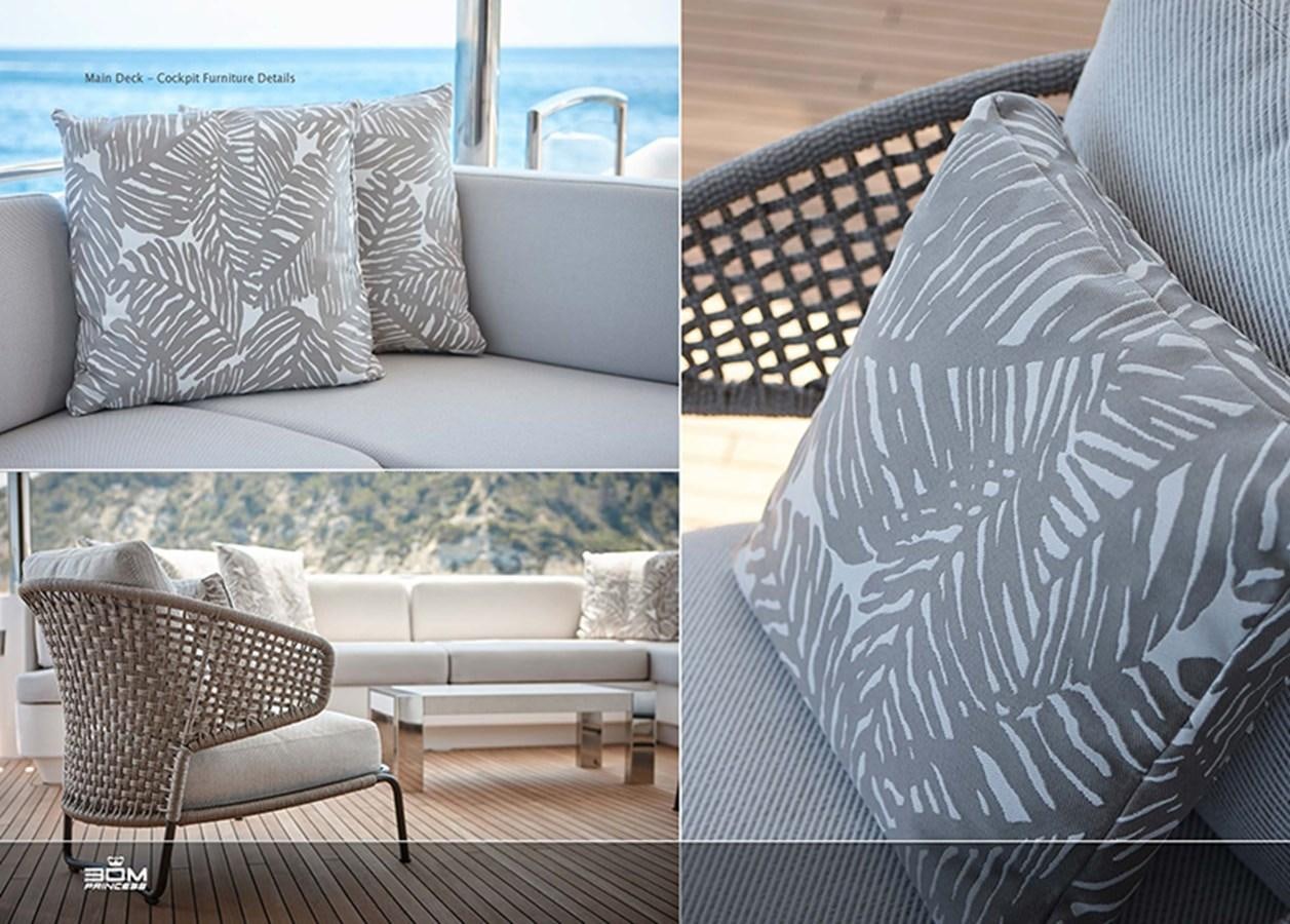 a couple of pillows on a couch aboard PRINCESS 30M Yacht for Sale