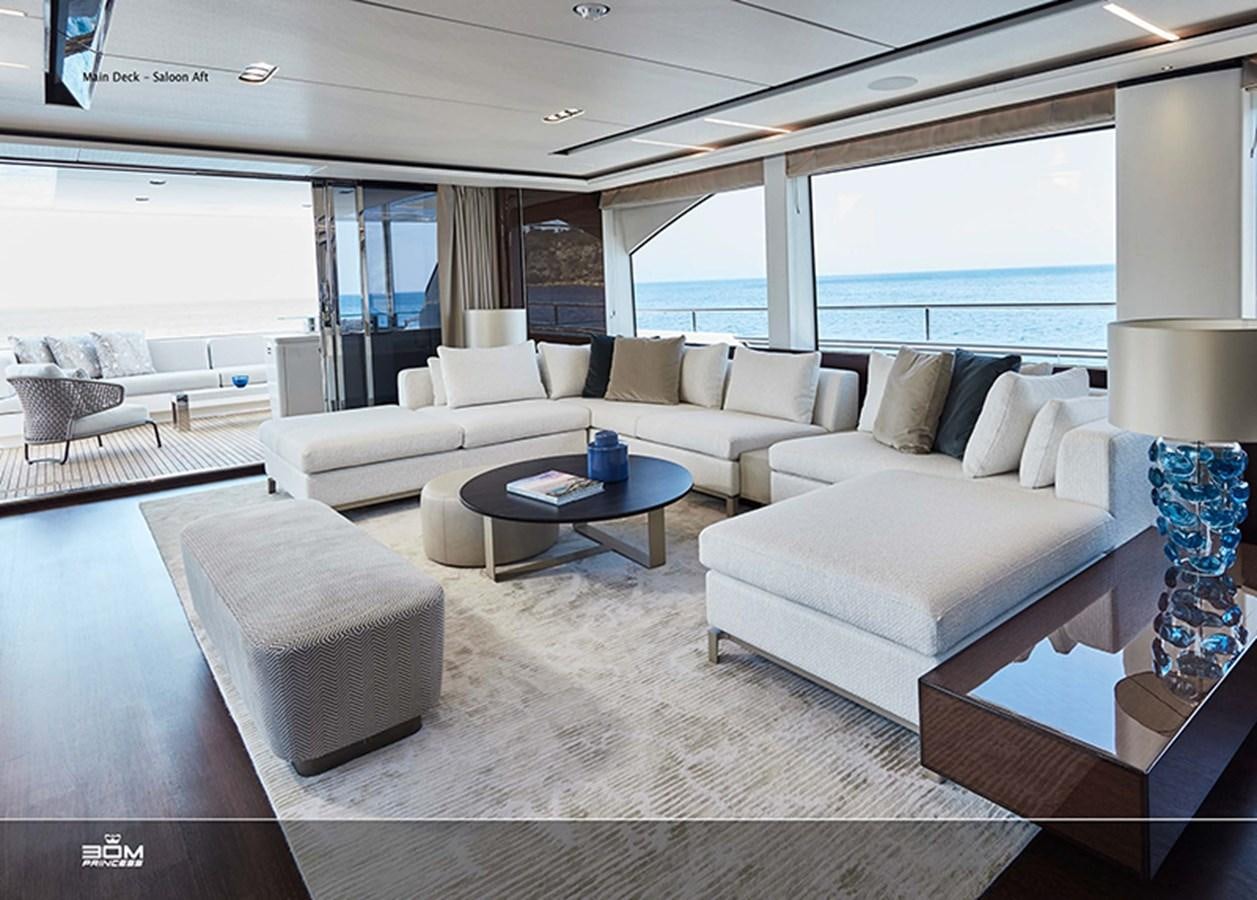a living room with a large window aboard PRINCESS 30M Yacht for Sale