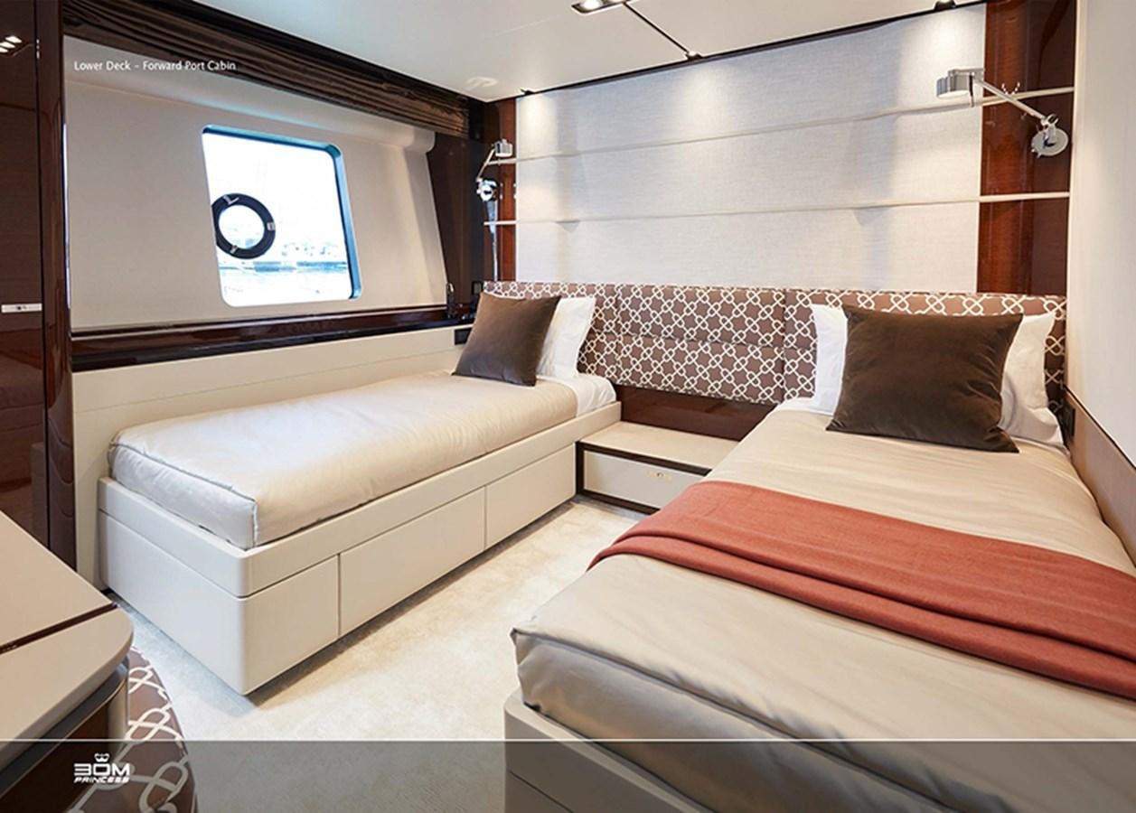 a room with a bed and a television aboard PRINCESS 30M Yacht for Sale