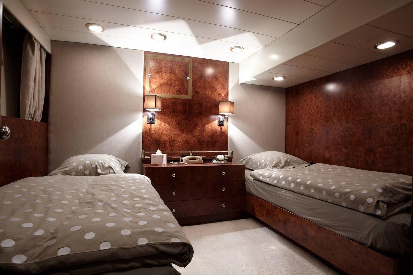 a room with two beds aboard QUEEN SOUTH Yacht for Sale