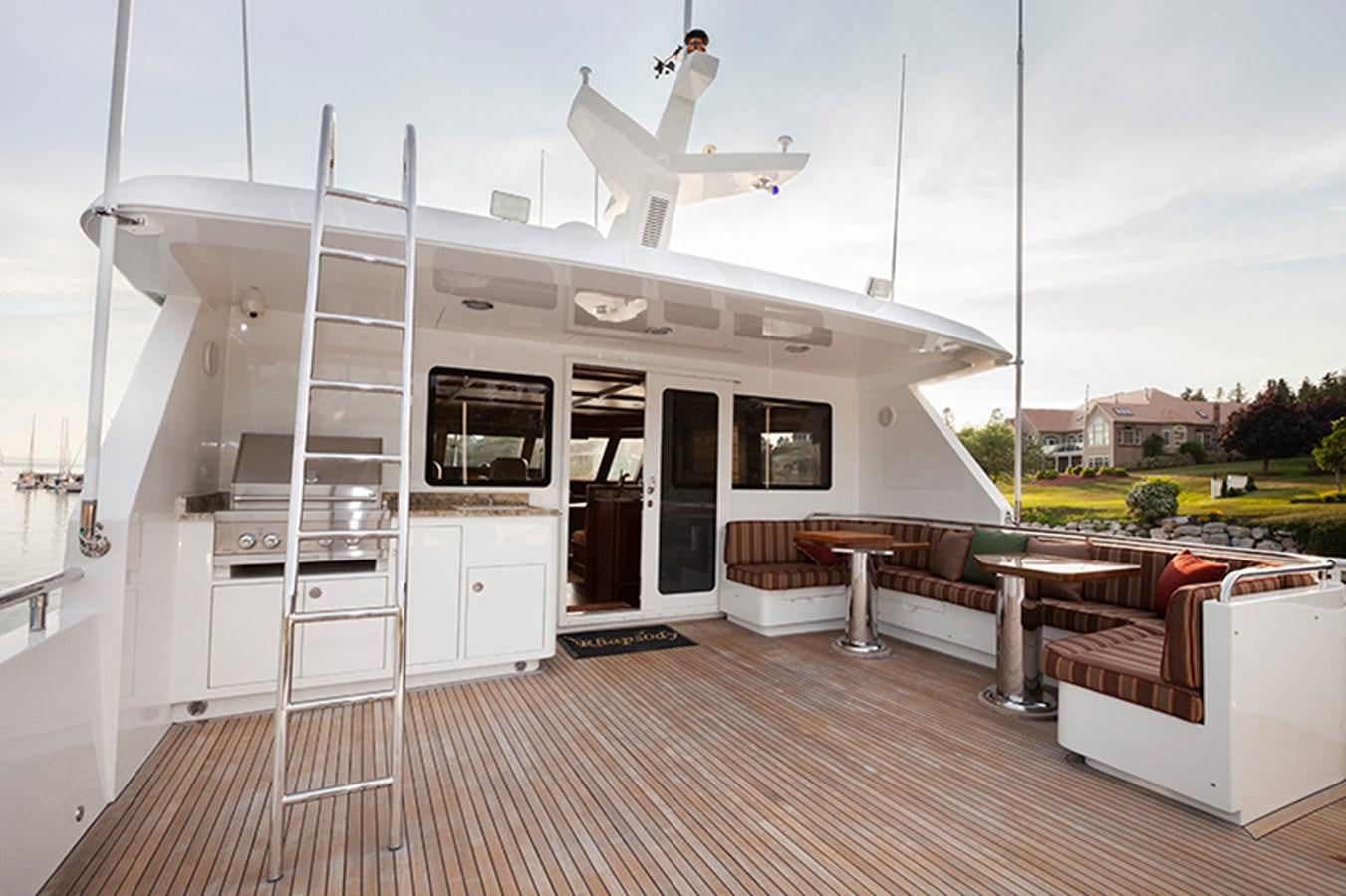 a white house with a ladder aboard RHAPSODY Yacht for Sale