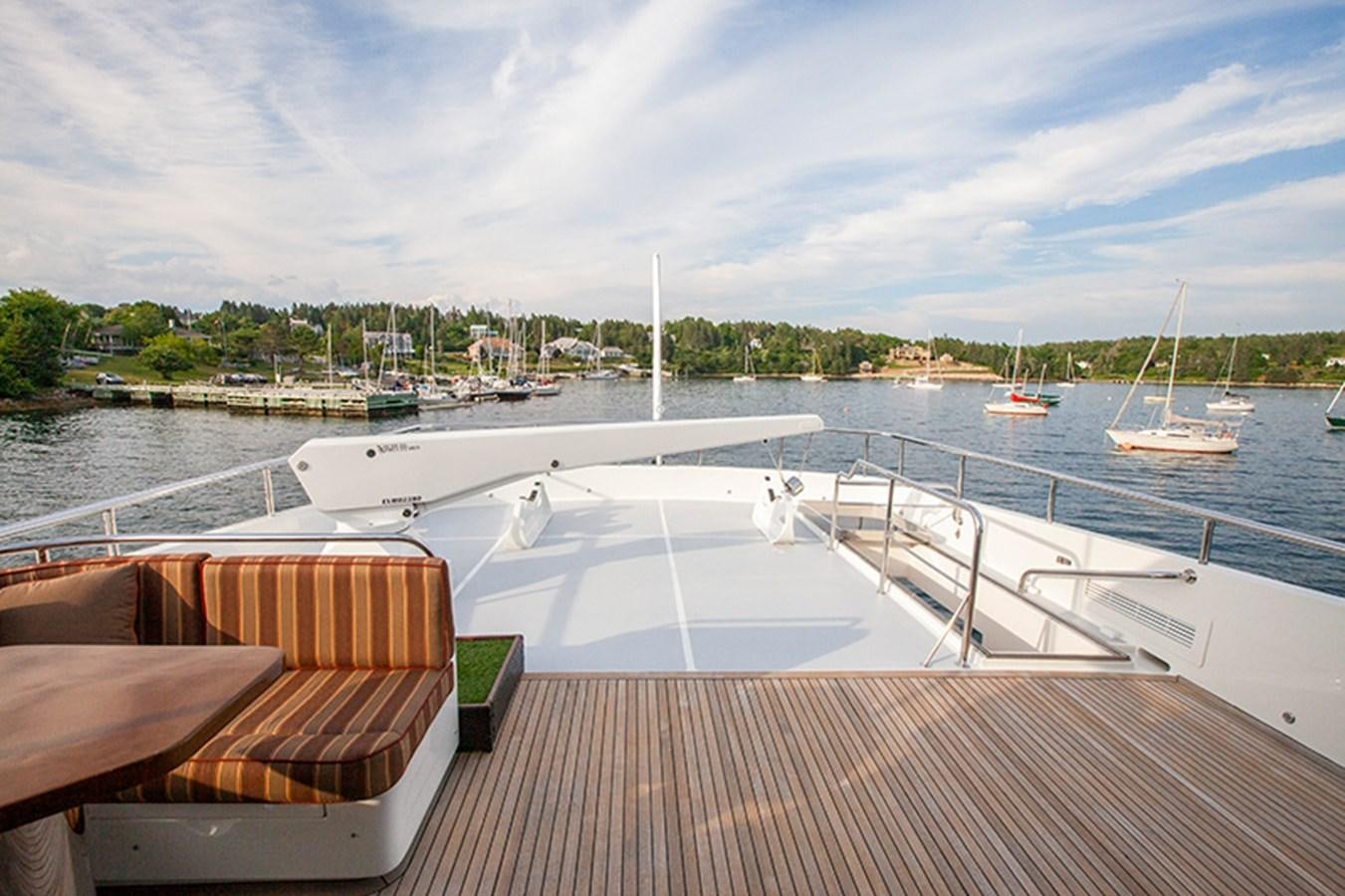 a deck with a boat on it aboard RHAPSODY Yacht for Sale