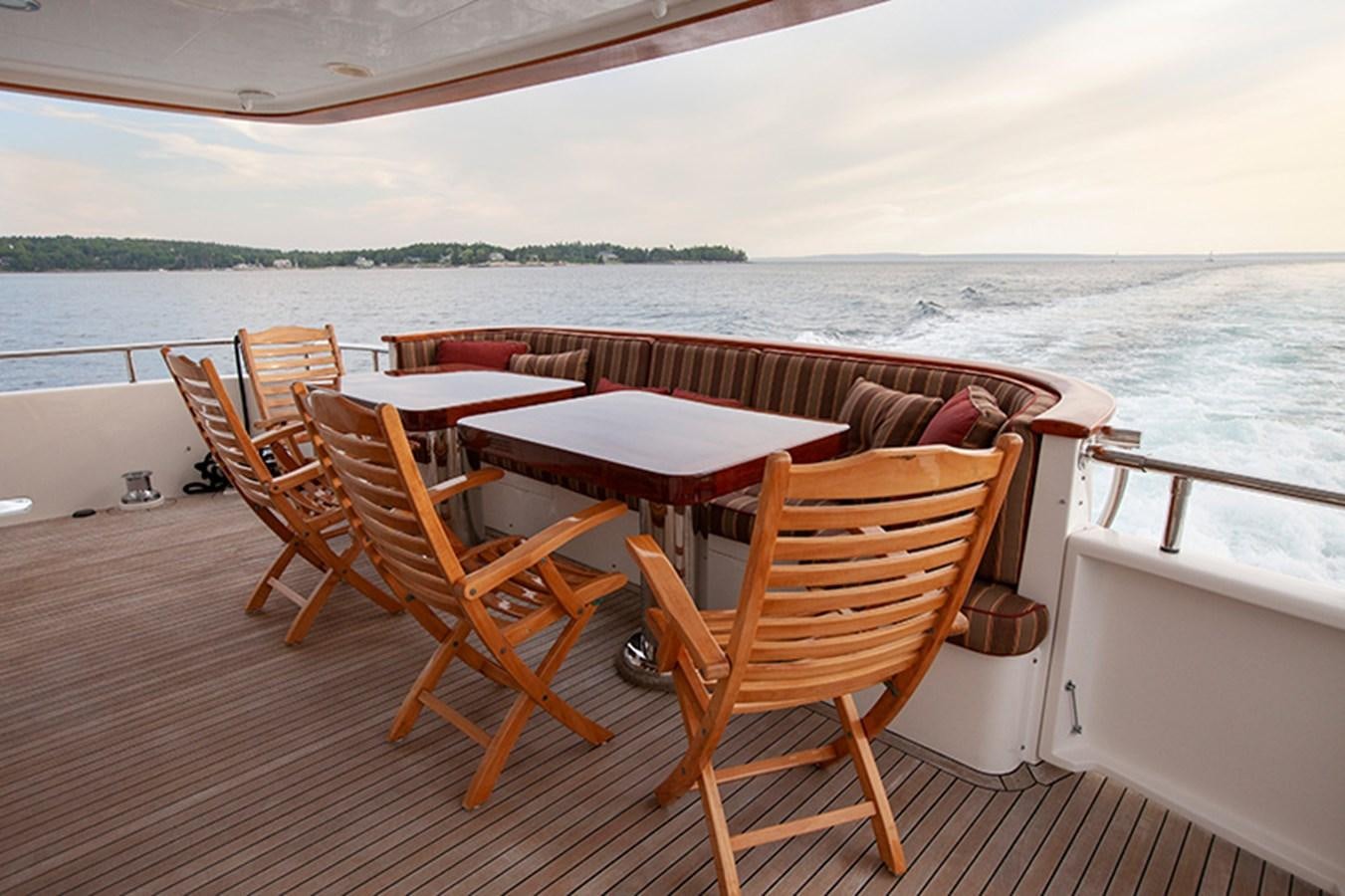 a group of chairs on a boat aboard RHAPSODY Yacht for Sale