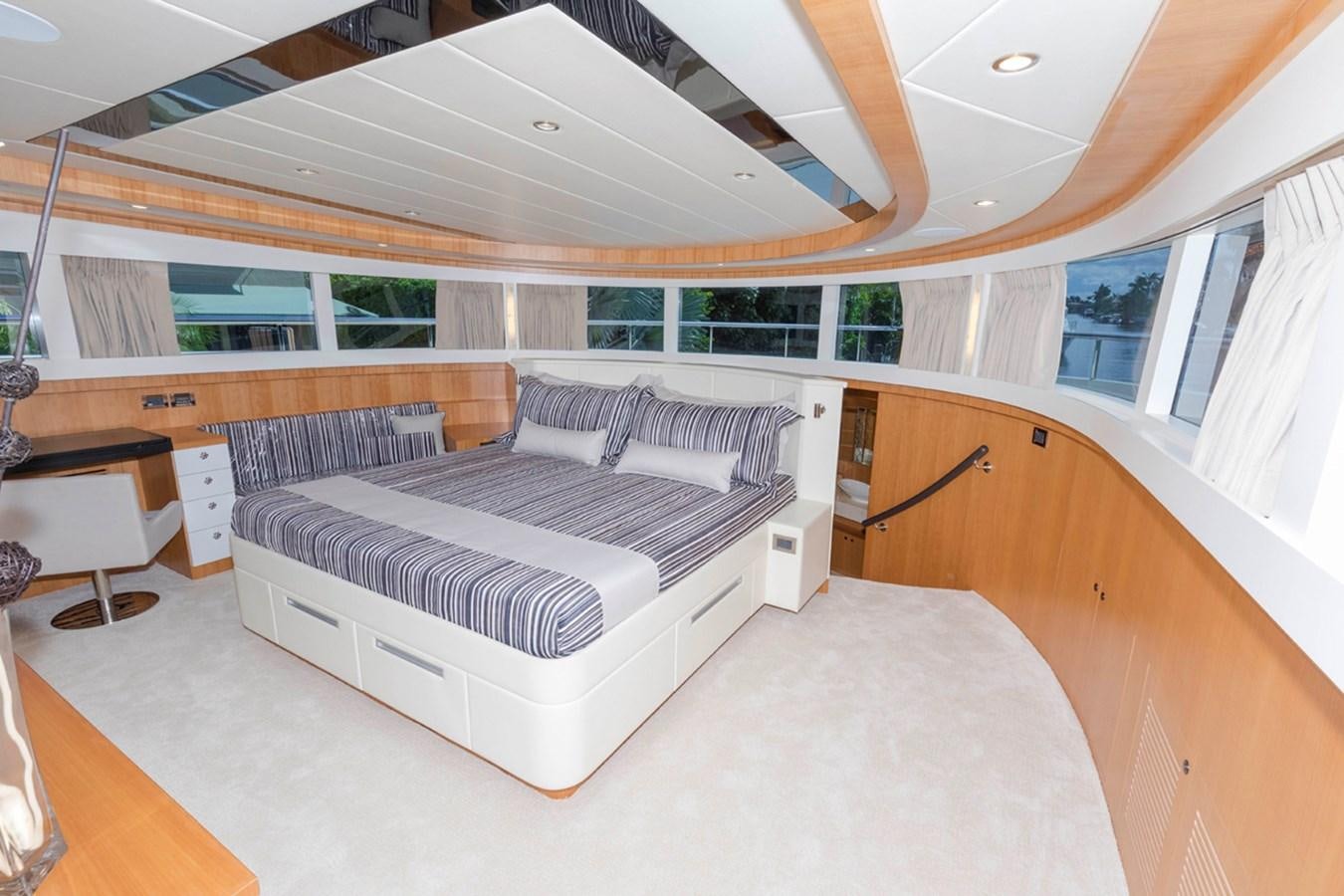 a room with a couch and a fan aboard DUMB ASS Yacht for Sale