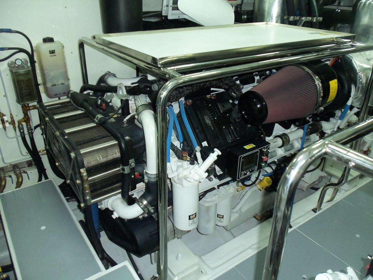 a close-up of a car engine aboard DUMB ASS Yacht for Sale