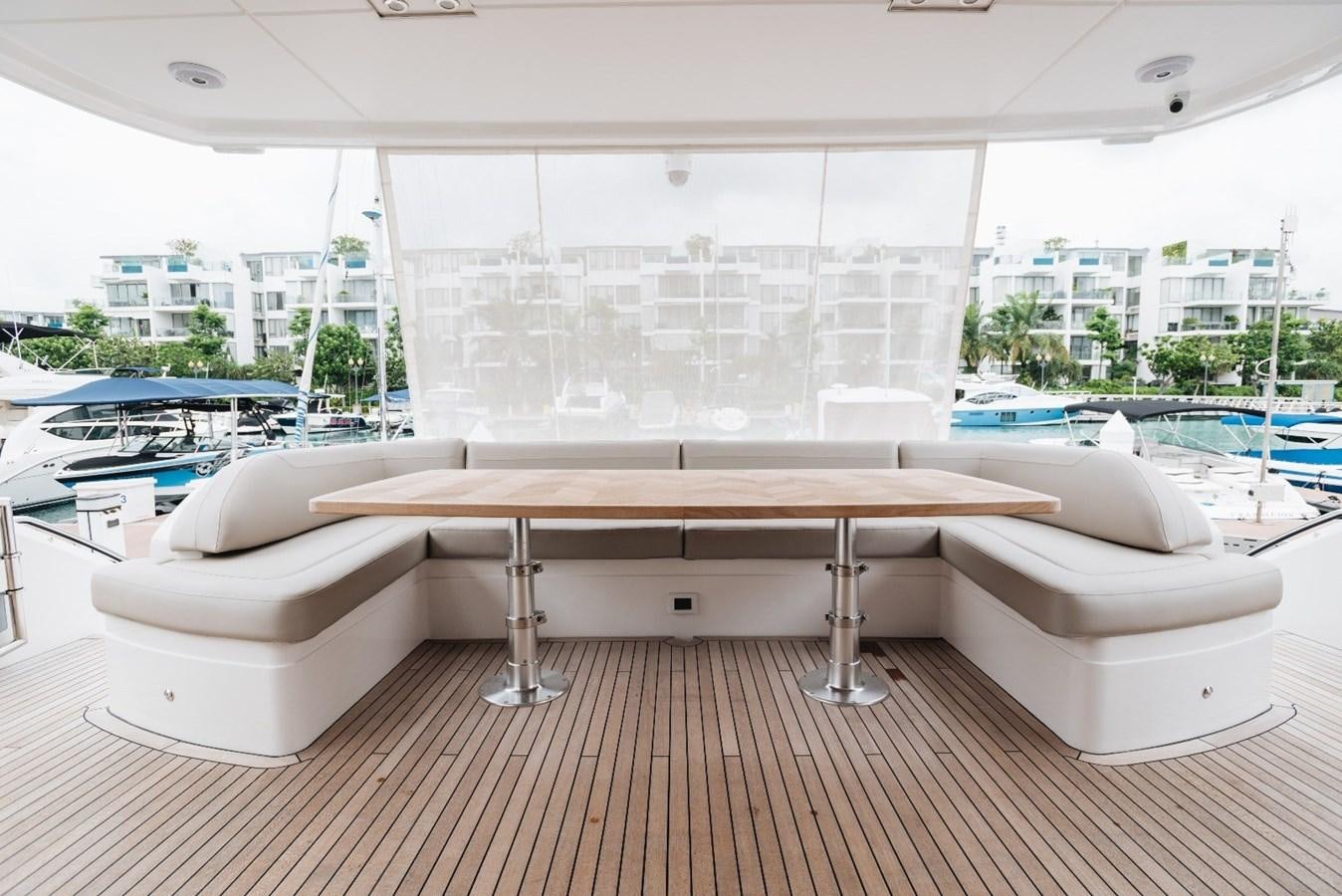 a room with a table and chairs aboard ISLAND PRINCESS Yacht for Sale