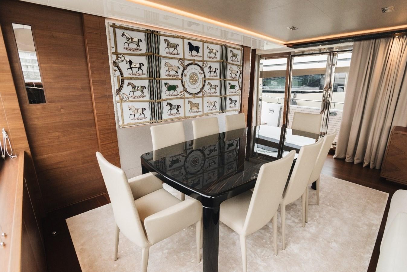 a room with chairs and a piano aboard ISLAND PRINCESS Yacht for Sale