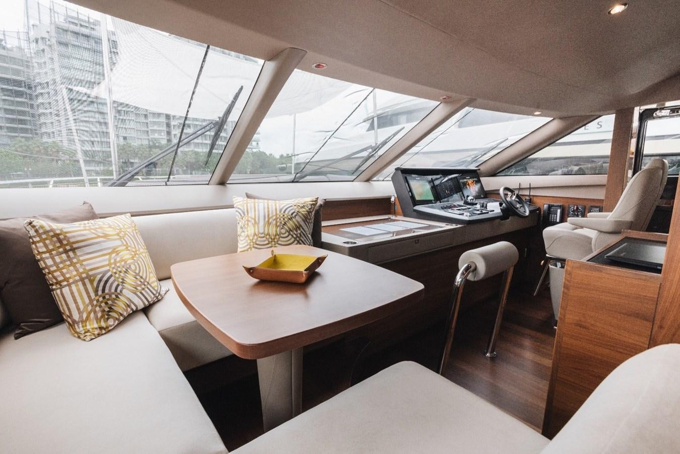 a room with a table and chairs aboard ISLAND PRINCESS Yacht for Sale