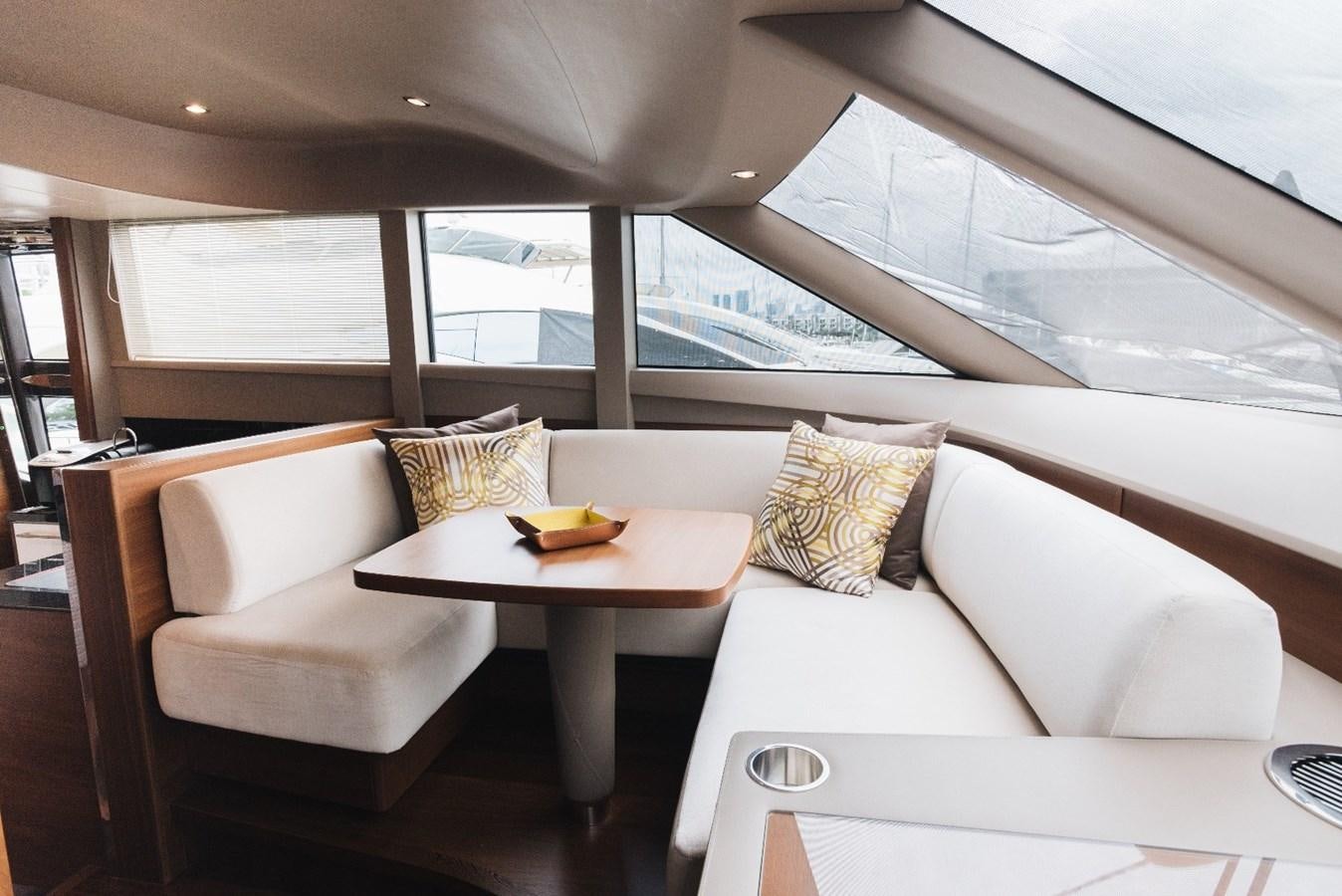 a room with a couch and a table aboard ISLAND PRINCESS Yacht for Sale