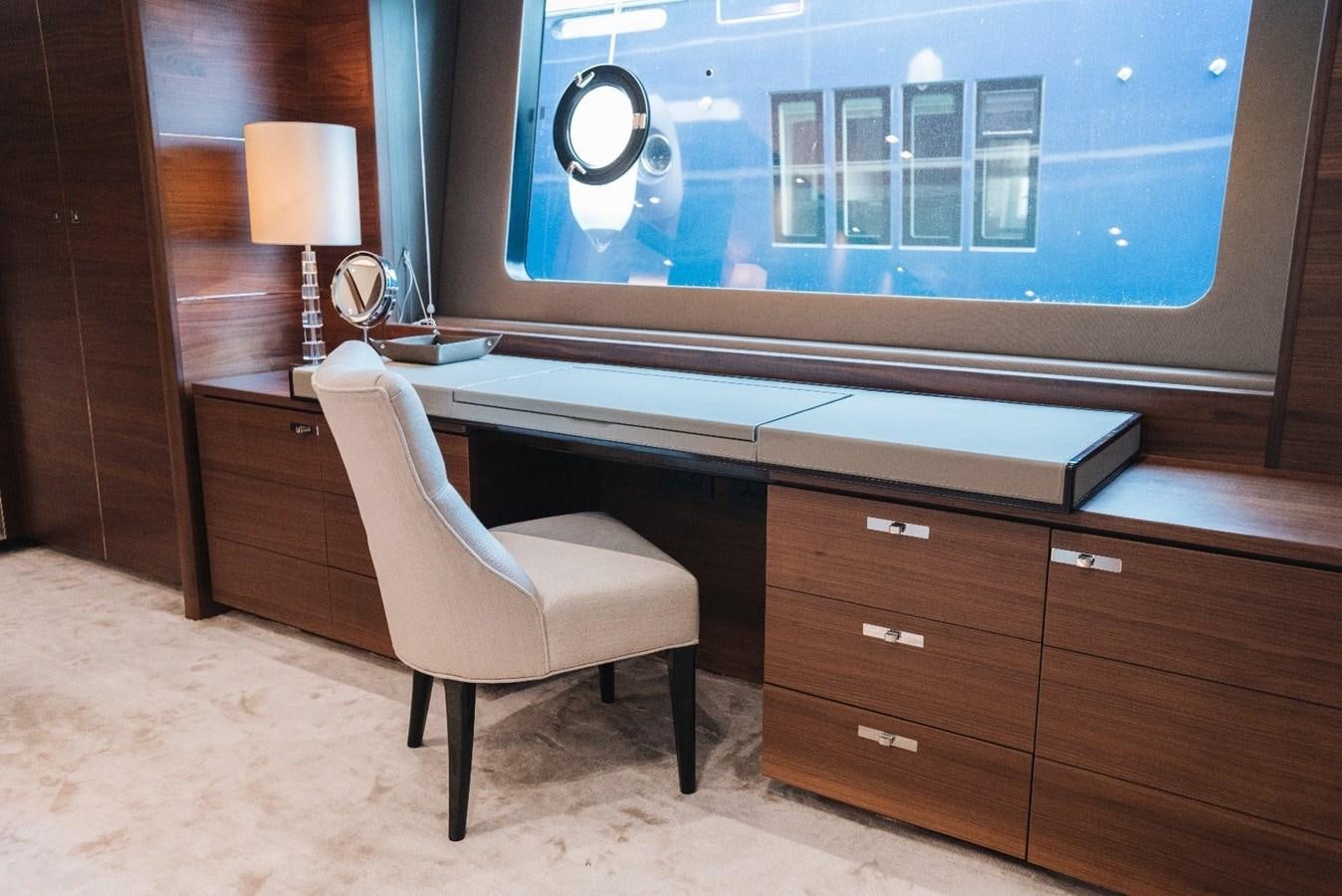 a room with a desk and a chair aboard ISLAND PRINCESS Yacht for Sale