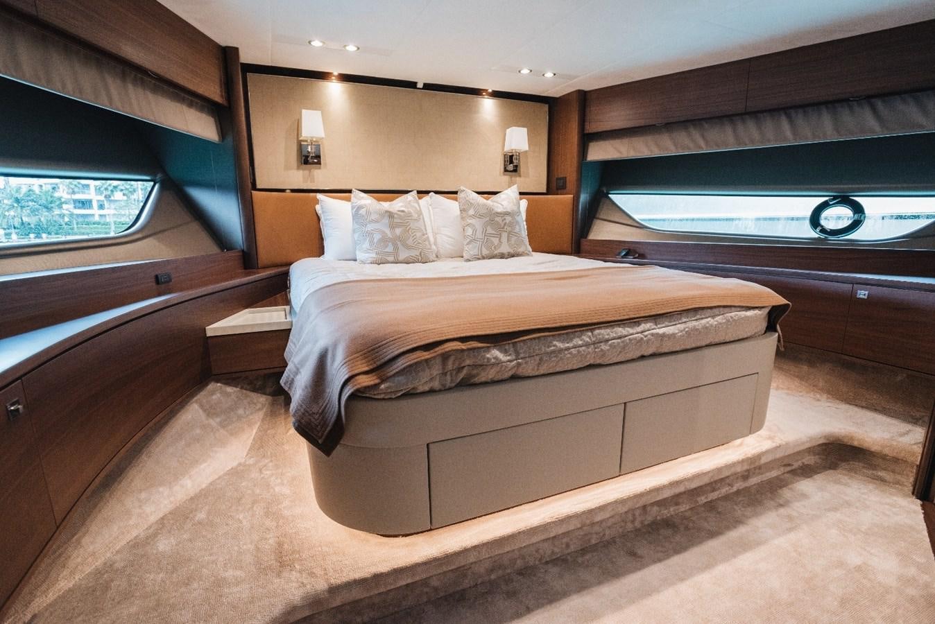 a bed in a room aboard ISLAND PRINCESS Yacht for Sale