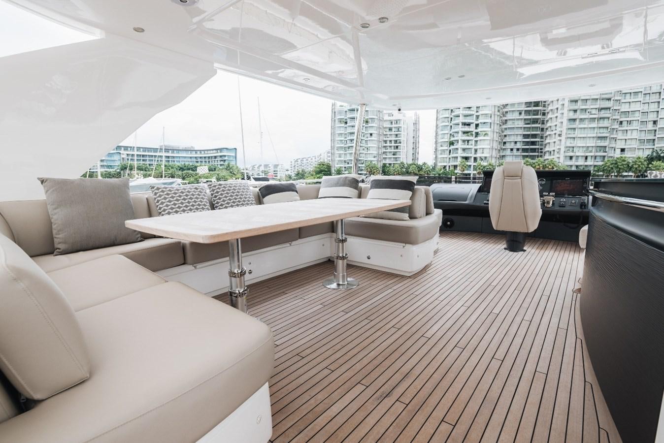 a room with couches and a table aboard ISLAND PRINCESS Yacht for Sale