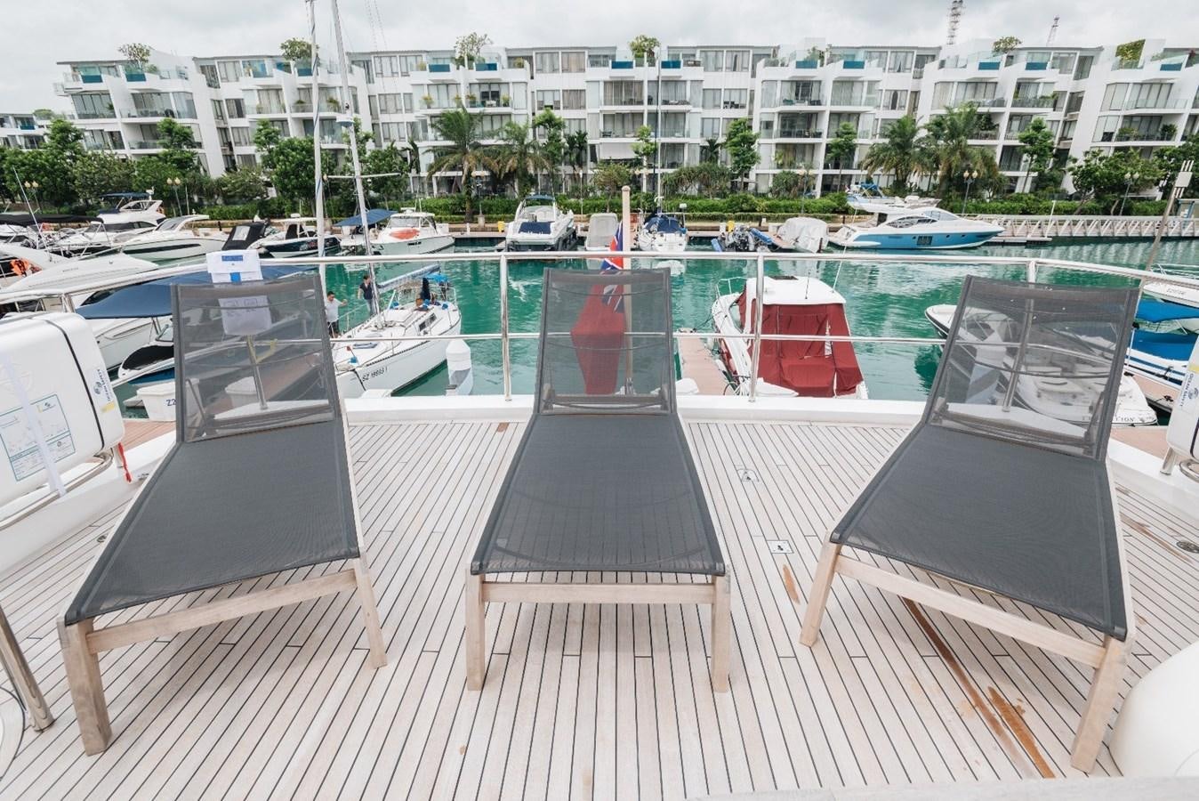 a deck with boats in it aboard ISLAND PRINCESS Yacht for Sale