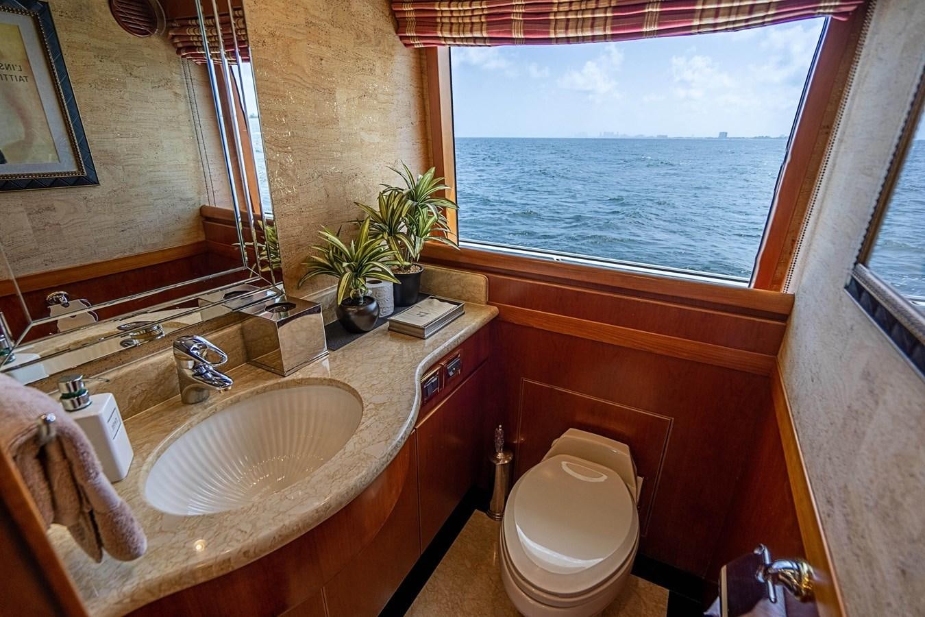 a bathroom with a sink and toilet aboard ROXY MARIA Yacht for Sale