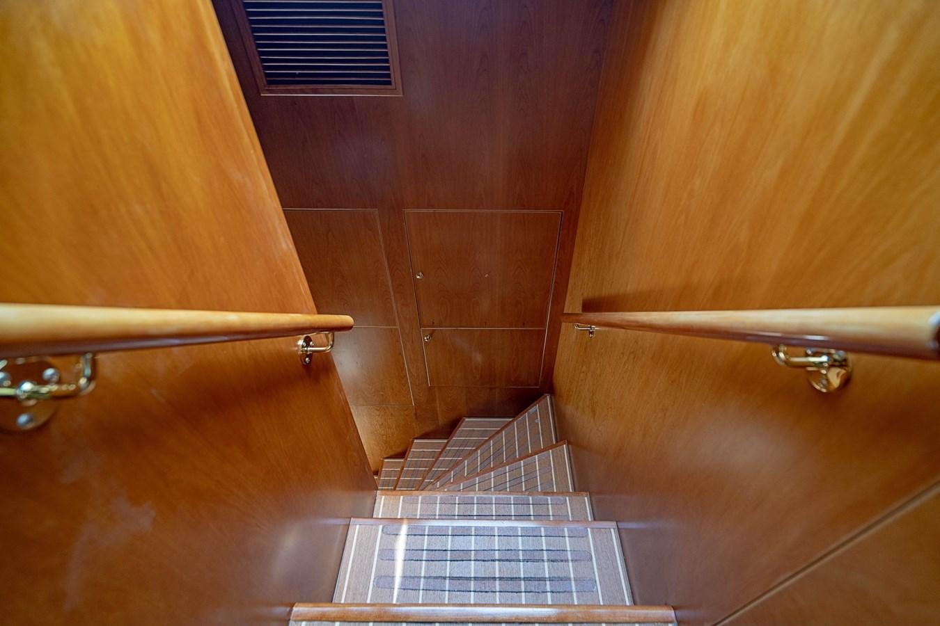 a wooden door with a tile floor aboard ROXY MARIA Yacht for Sale