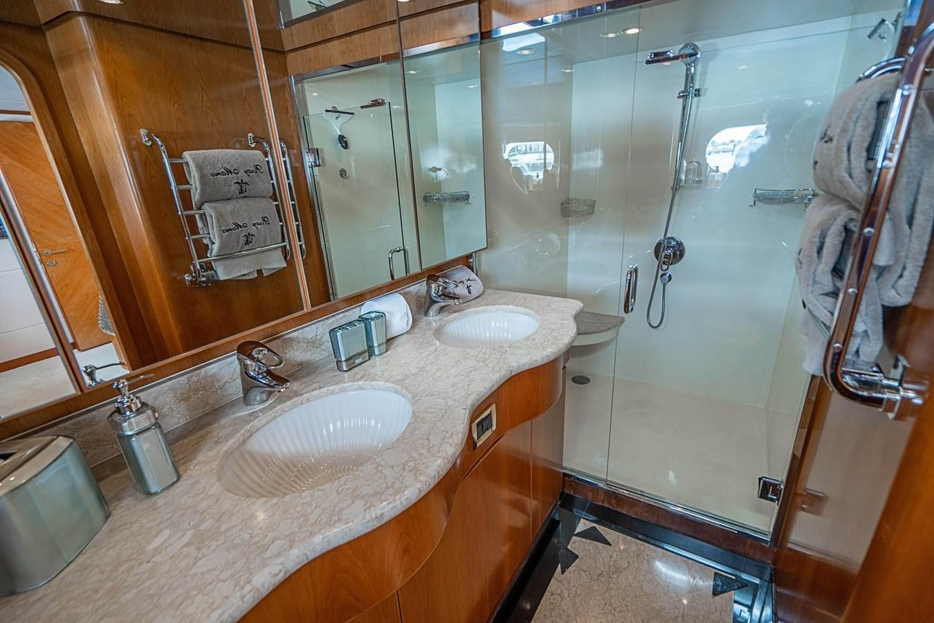 a bathroom with a large mirror aboard ROXY MARIA Yacht for Sale