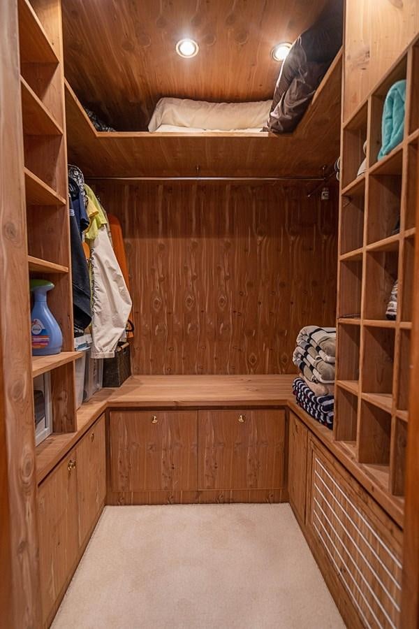 a room with a wood closet and a bed aboard ROXY MARIA Yacht for Sale