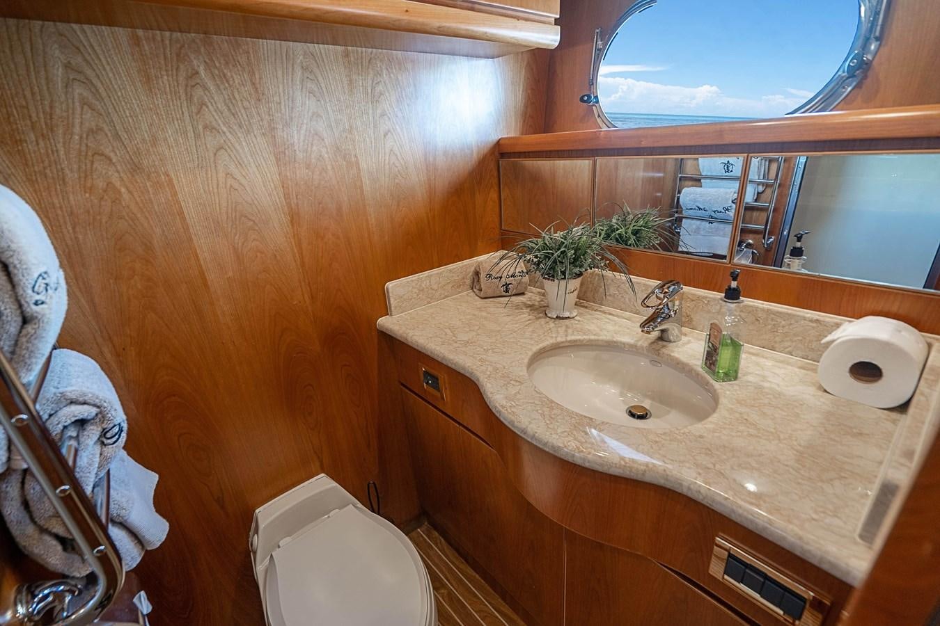 a bathroom with a sink and a toilet aboard ROXY MARIA Yacht for Sale