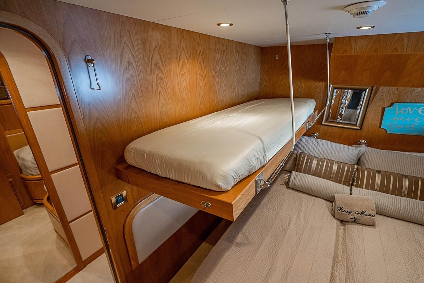 a room with a bed and a couch aboard ROXY MARIA Yacht for Sale