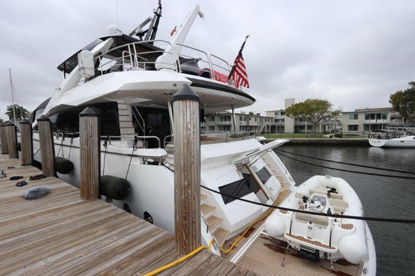 a boat on a dock aboard AQUA VISTA Yacht for Sale