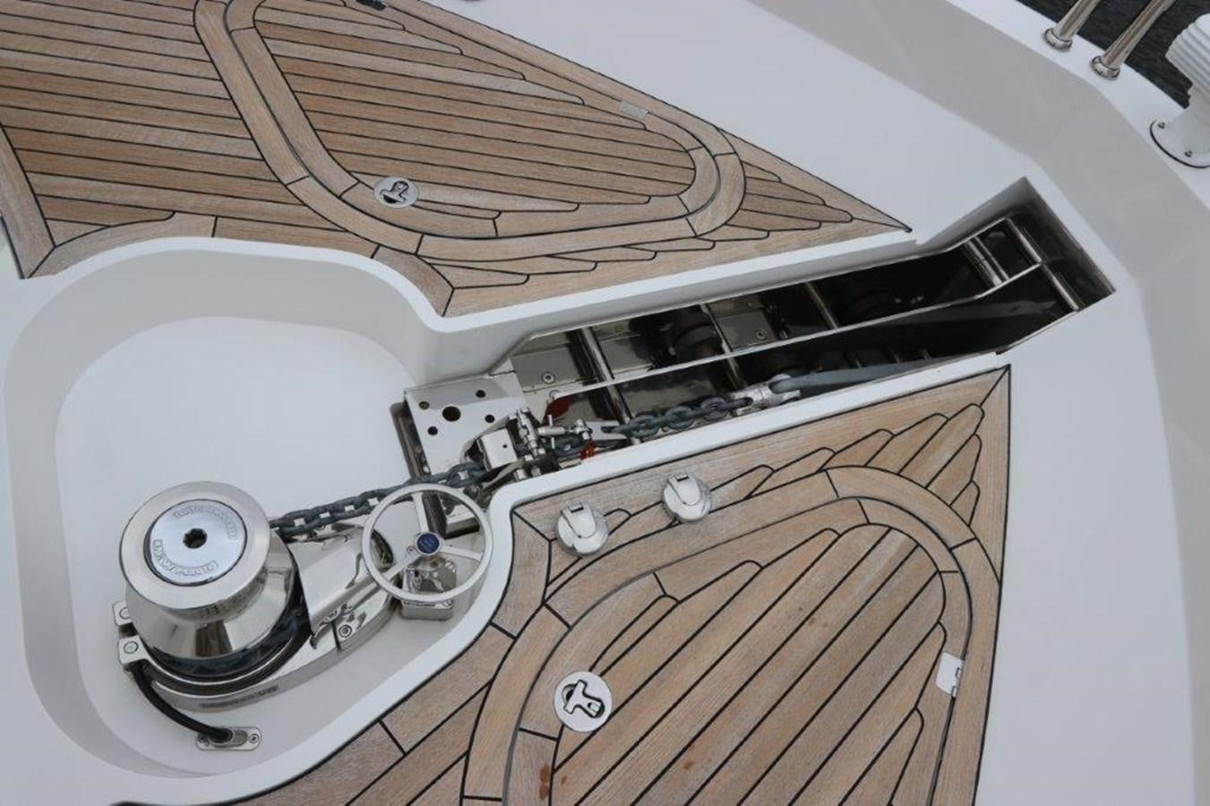 a white fan on a white ceiling aboard AQUA VISTA Yacht for Sale