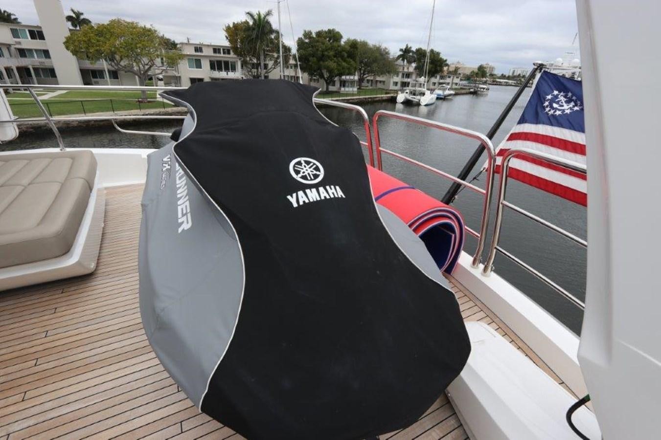 a black hat on a table aboard AQUA VISTA Yacht for Sale