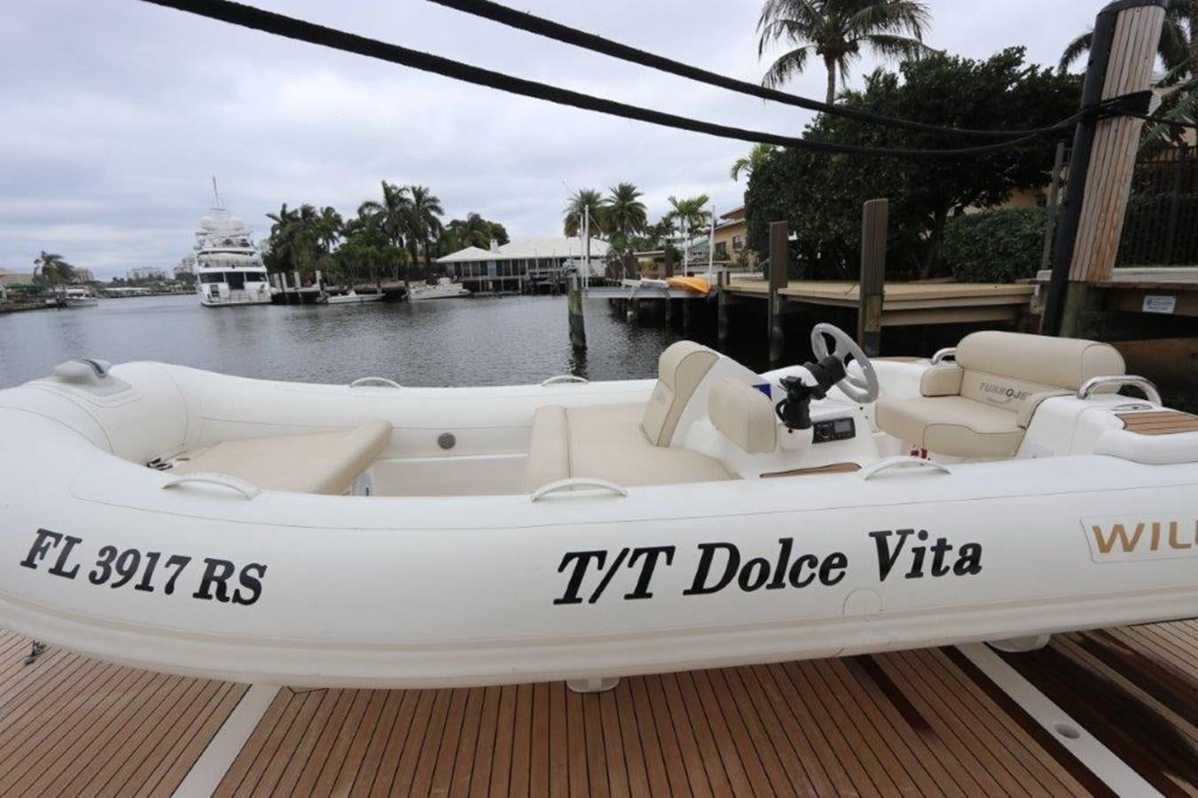 a boat with a sign on the front aboard AQUA VISTA Yacht for Sale