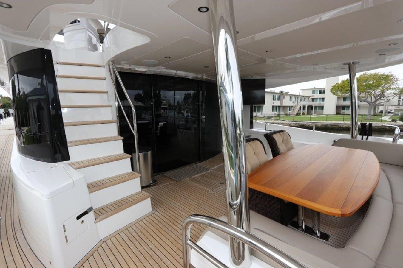 a room with a bed and a large mirror aboard AQUA VISTA Yacht for Sale