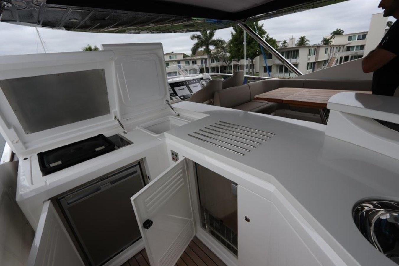 a car with a large amount of computers on it aboard AQUA VISTA Yacht for Sale