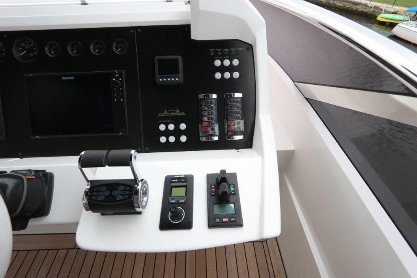 a black and white electronic device aboard AQUA VISTA Yacht for Sale