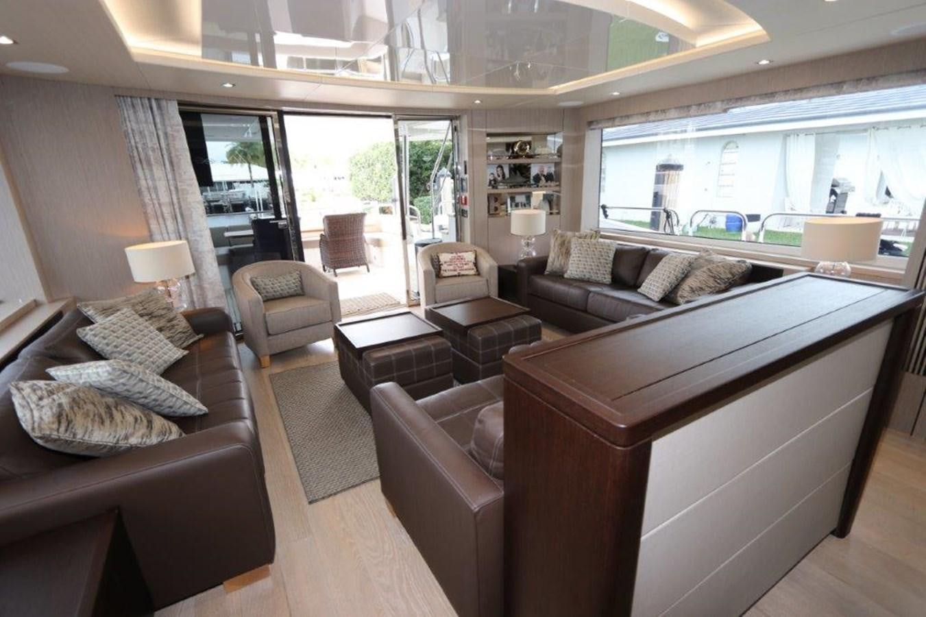 a living room with a large bed aboard AQUA VISTA Yacht for Sale