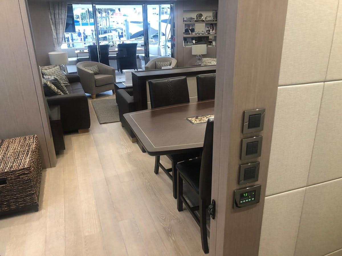 a room with a desk and a chair aboard AQUA VISTA Yacht for Sale