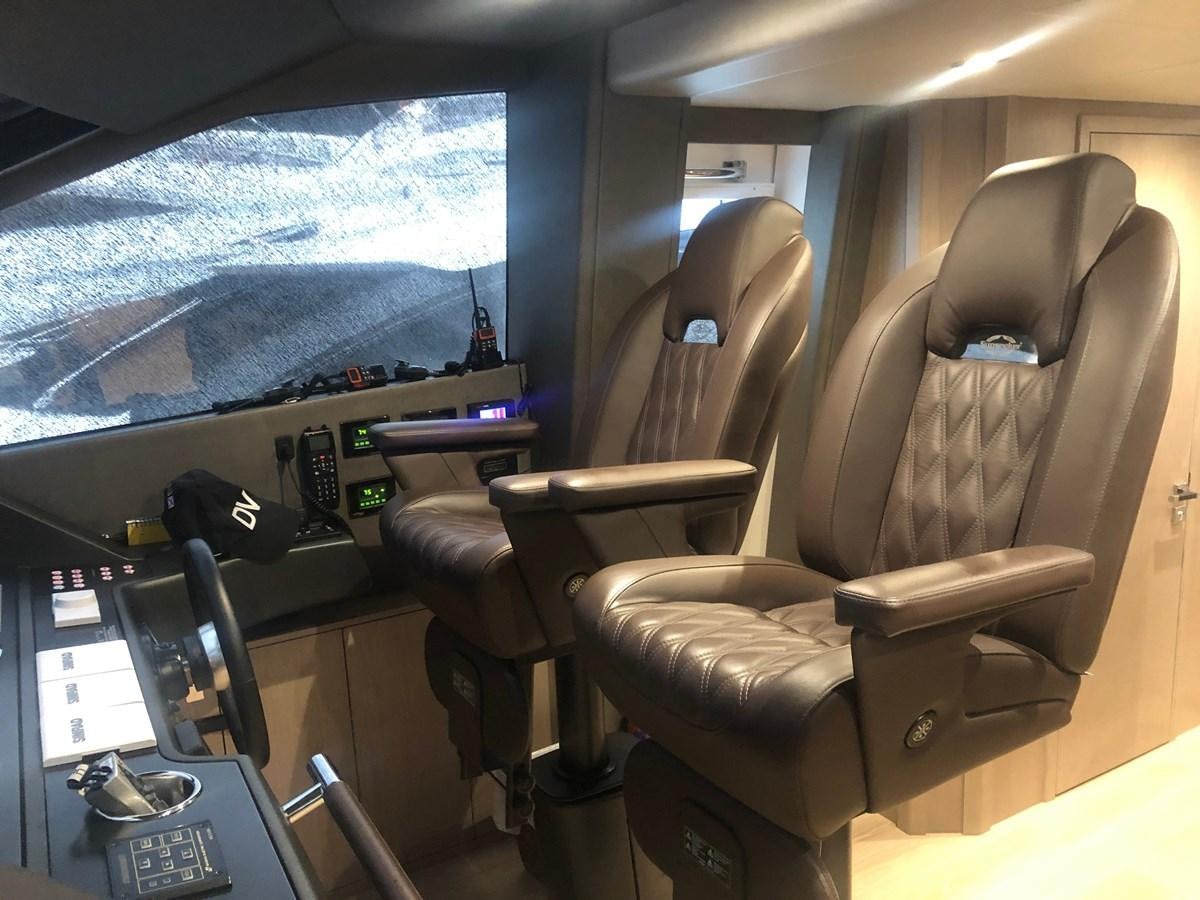 a car with a view of the mountains aboard AQUA VISTA Yacht for Sale