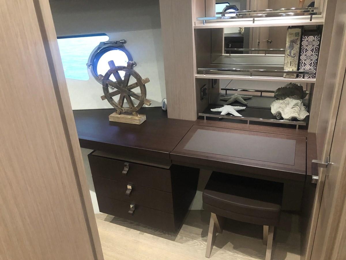 a cat sitting on a shelf aboard AQUA VISTA Yacht for Sale