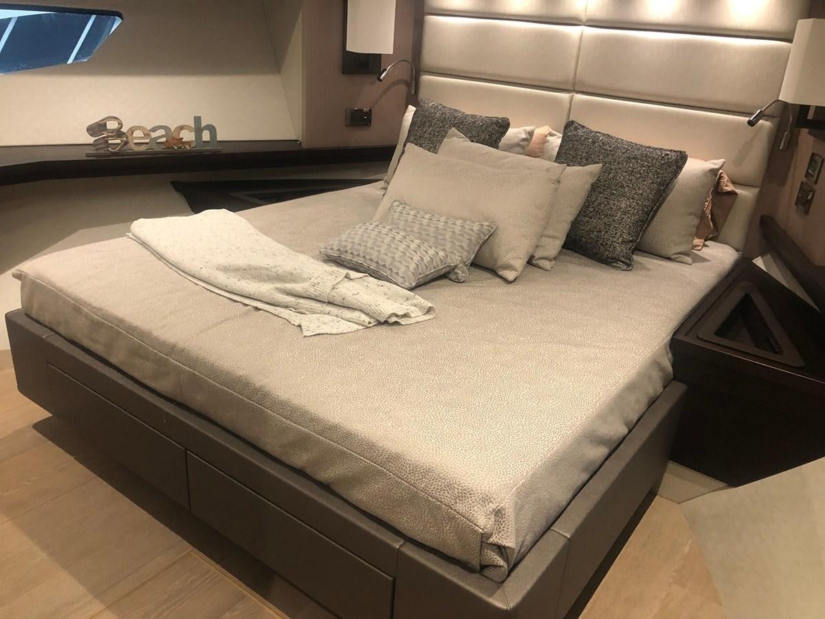 a bed with pillows aboard AQUA VISTA Yacht for Sale