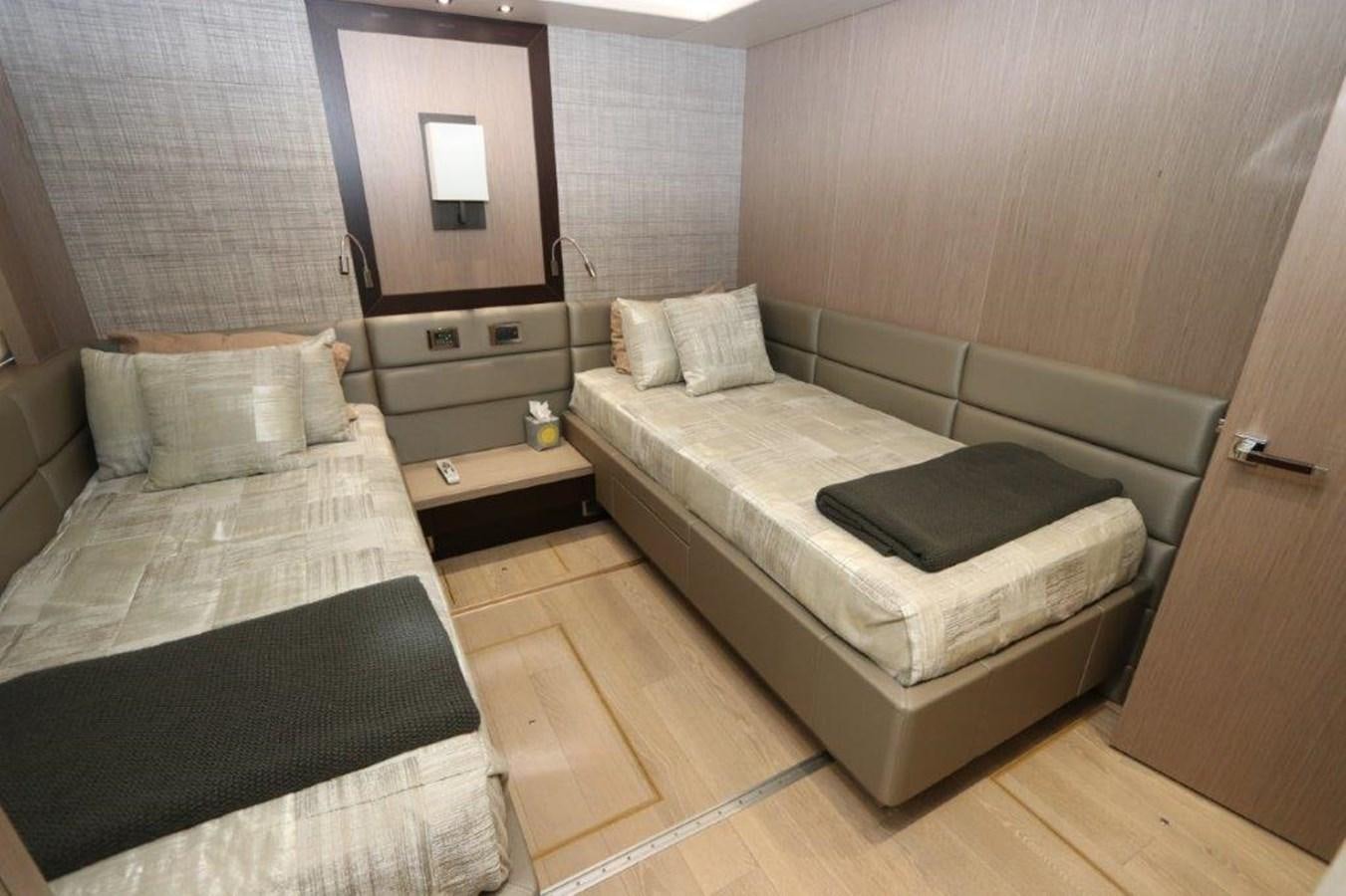 a room with two beds aboard AQUA VISTA Yacht for Sale