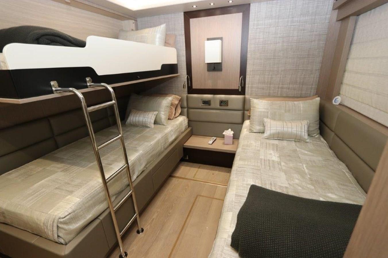 a room with two beds aboard AQUA VISTA Yacht for Sale
