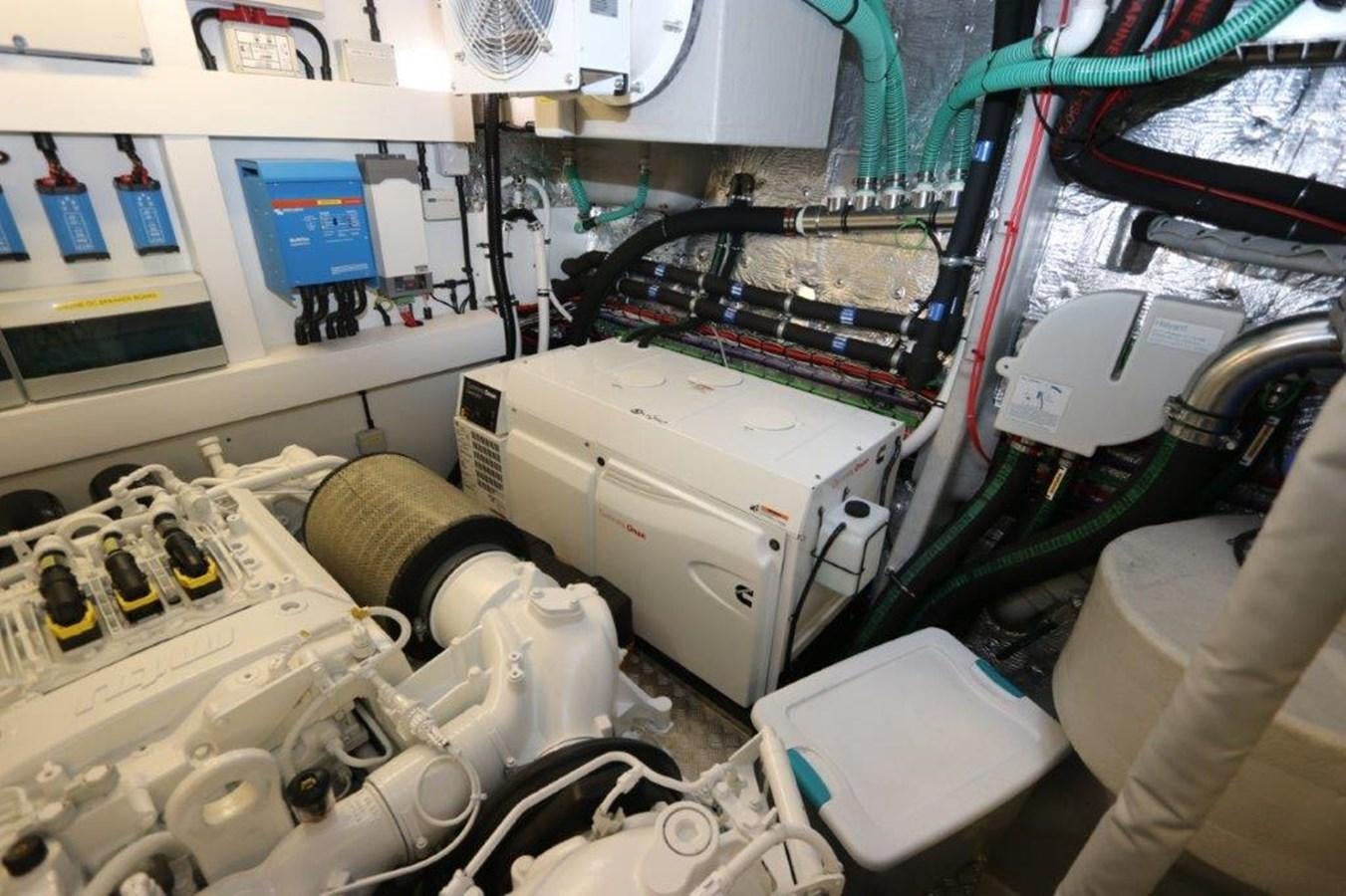 a room with a machine and equipment aboard AQUA VISTA Yacht for Sale