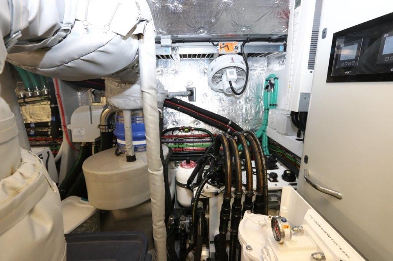 a room with a machine and equipment aboard AQUA VISTA Yacht for Sale