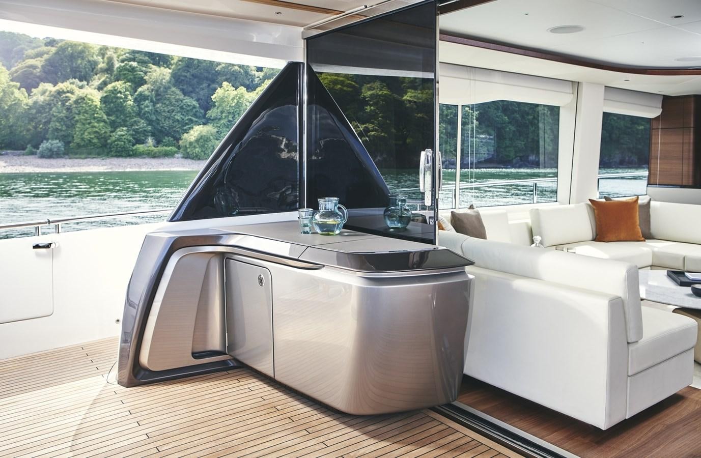a modern looking living room aboard PRINCESS Y85/504 Yacht for Sale