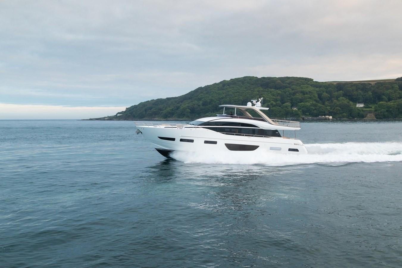 a white boat in the water aboard PRINCESS Y85/504 Yacht for Sale