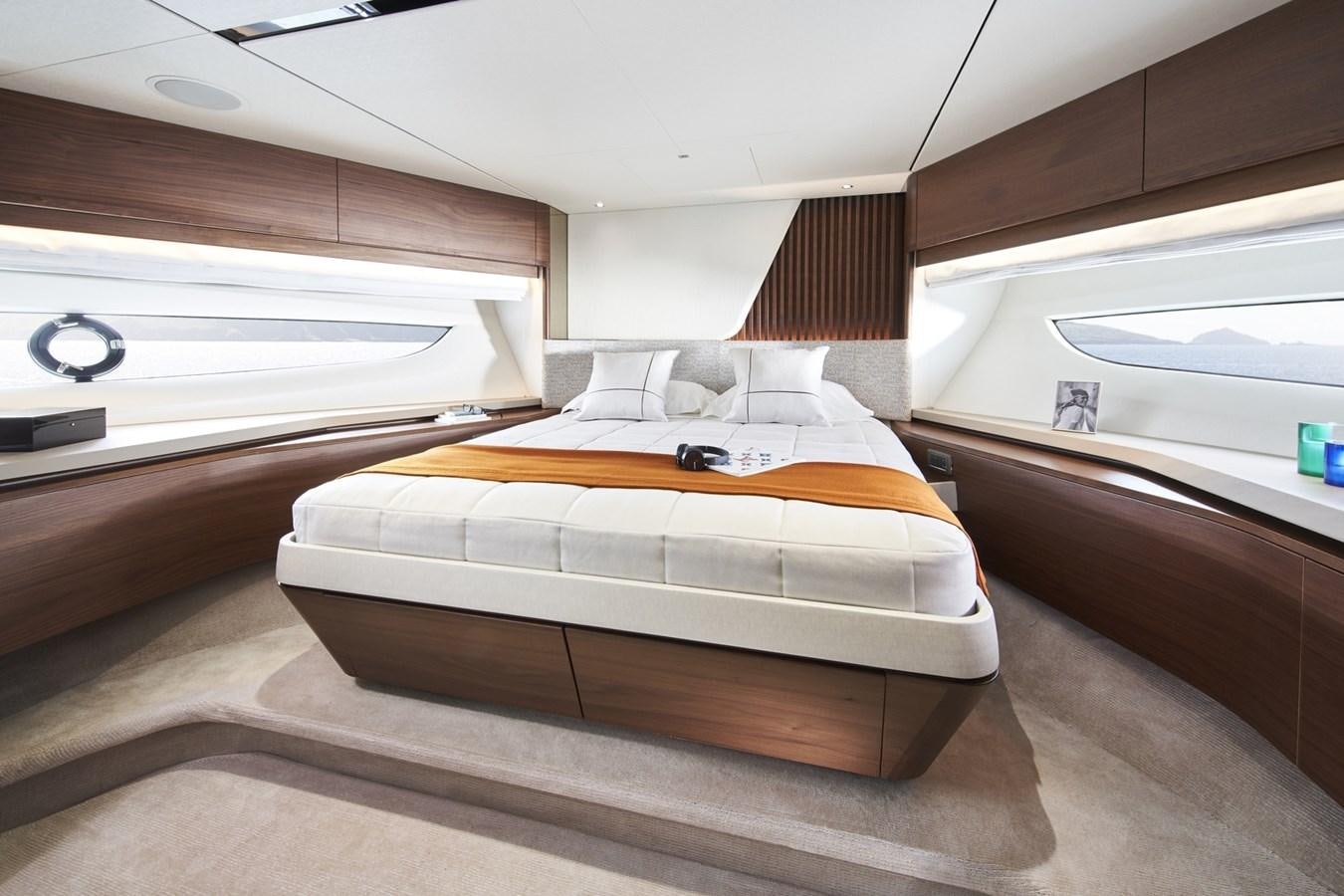 a bed in a room aboard PRINCESS Y85/504 Yacht for Sale