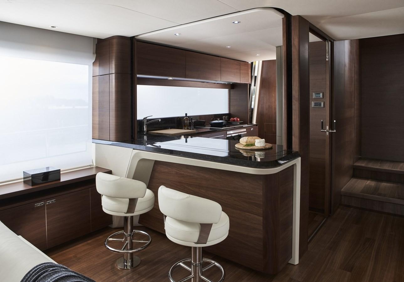 a kitchen with a mirror aboard PRINCESS Y85/504 Yacht for Sale