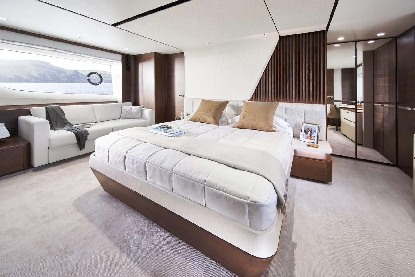 a person lying on a bed aboard PRINCESS Y85/504 Yacht for Sale