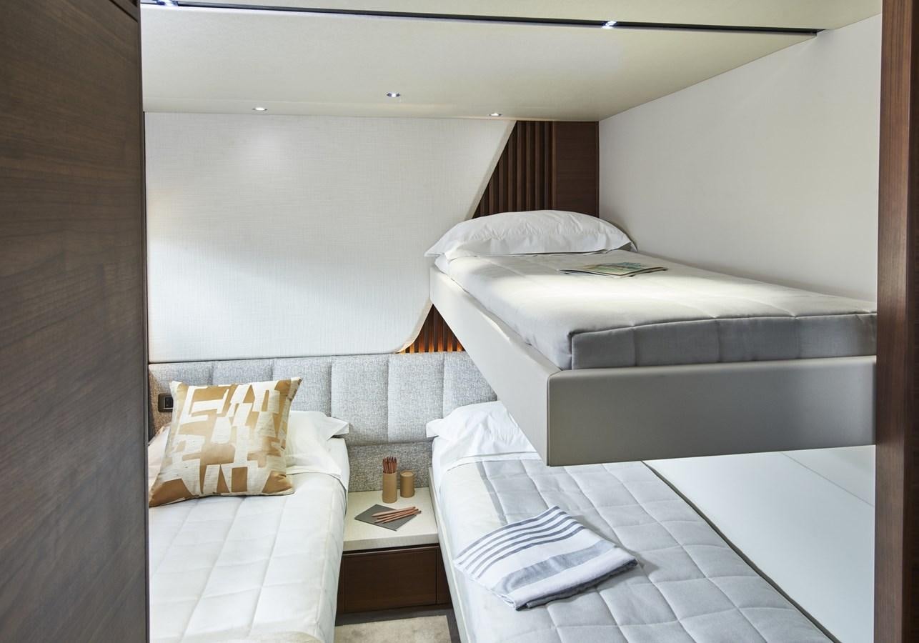 a room with two beds aboard PRINCESS Y85/504 Yacht for Sale