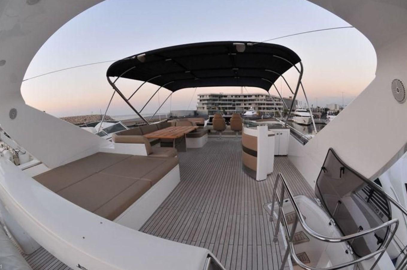 a large white tent with a black umbrella on it aboard PRINCESS 85MY Yacht for Sale