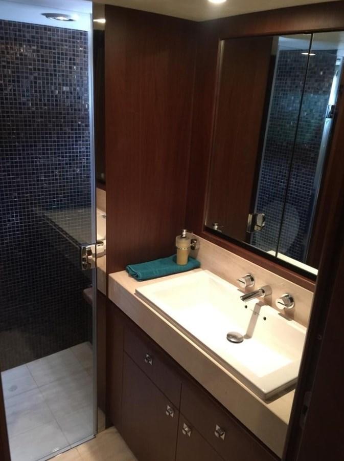 a bathroom with a sink and a shower aboard PRINCESS 85MY Yacht for Sale